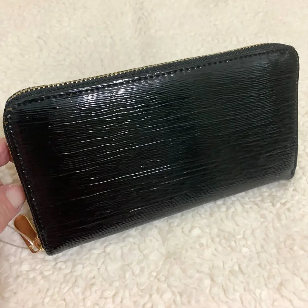 Black Wavy Texture Striated Patent Leather Zip Around Continental Clutch Wallet